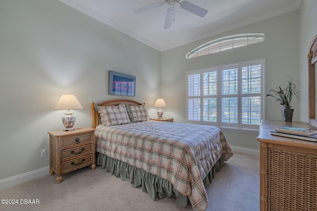 bedroom featuring light colored carpet, ceiling fan, and ornamental molding