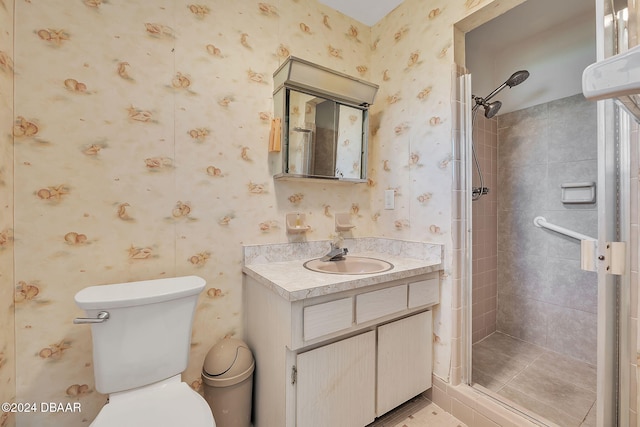 bathroom featuring walk in shower, vanity, and toilet