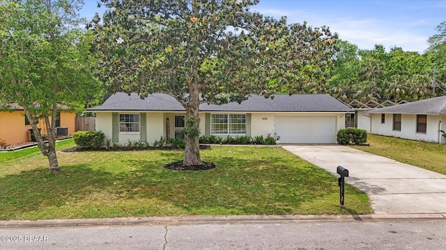 ranch-style house with a front yard, concrete driveway, a garage, and cooling unit