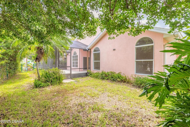 19 Meadow Ridge Vw, Ormond Beach, FL 32174 - rear view of property featuring stucco siding