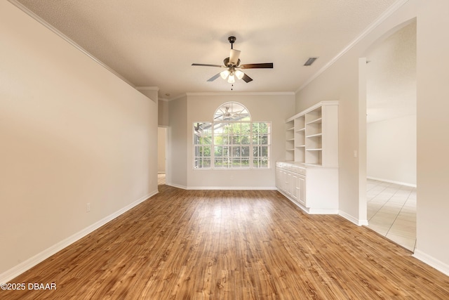 19 Meadow Ridge Vw, Ormond Beach, FL 32174 - unfurnished living room with ceiling fan, light wood-style floors, and crown molding