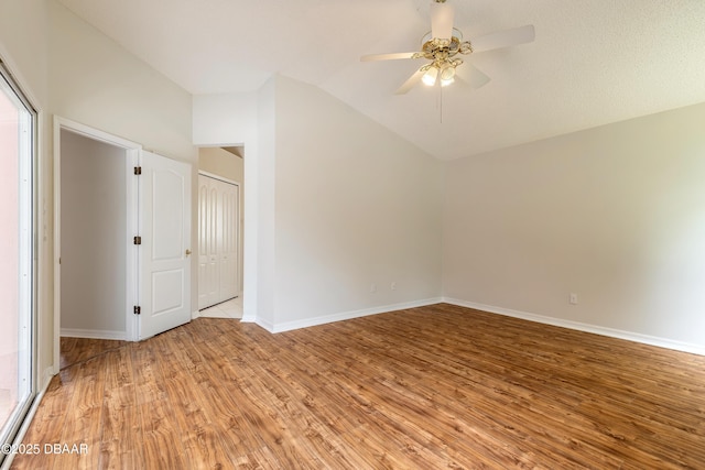 19 Meadow Ridge Vw, Ormond Beach, FL 32174 - empty room featuring light wood-style floors, lofted ceiling, and a ceiling fan