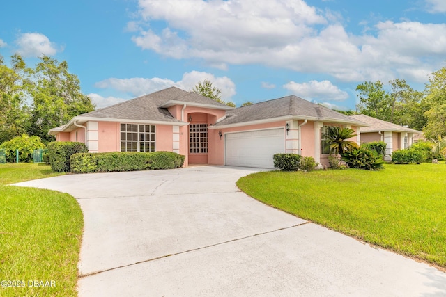 19 Meadow Ridge Vw, Ormond Beach, FL 32174 - single story home with a garage, a front lawn, stucco siding, and driveway