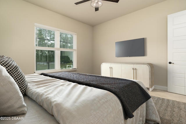 150 Portofino Blvd, New Smyrna Beach, FL 32168 - bedroom with light carpet and ceiling fan