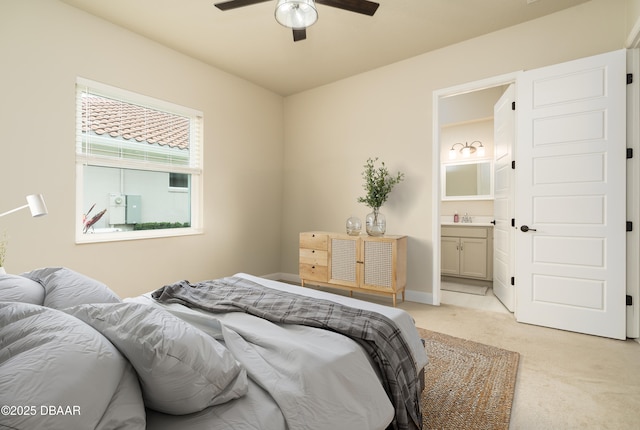 150 Portofino Blvd, New Smyrna Beach, FL 32168 - bedroom with light colored carpet, connected bathroom, and ceiling fan