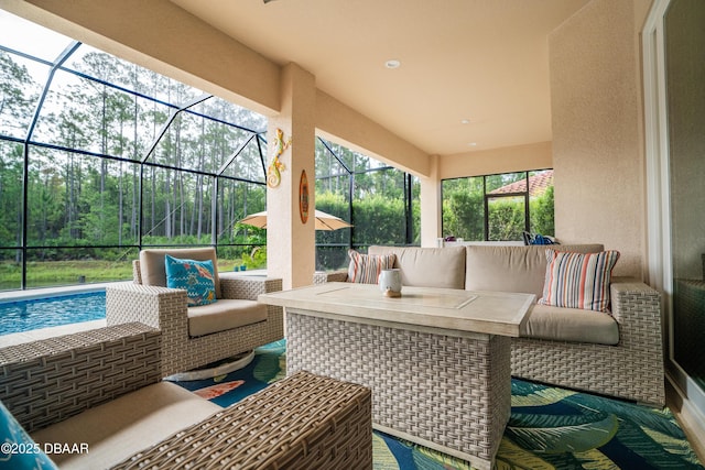 150 Portofino Blvd, New Smyrna Beach, FL 32168 - view of patio / terrace featuring an outdoor living space, glass enclosure, and an outdoor pool