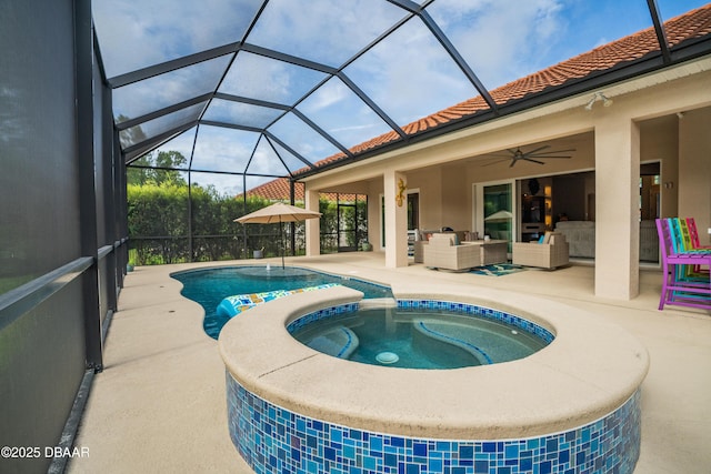 150 Portofino Blvd, New Smyrna Beach, FL 32168 - view of pool with an outdoor hangout area, a patio area, a ceiling fan, a pool with connected hot tub, and glass enclosure