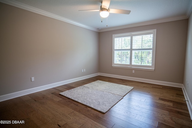 76 Longridge Ln, Ormond Beach, FL 32174 - spare room with dark wood finished floors, ornamental molding, baseboards, and ceiling fan
