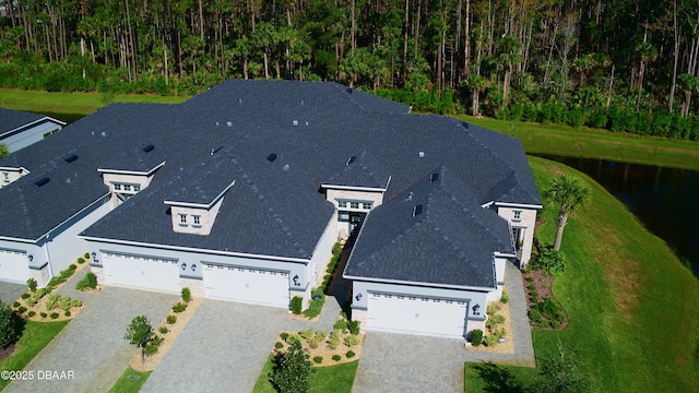 bird's eye view with a water view