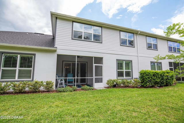 76 Longridge Ln, Ormond Beach, FL 32174 - rear view of property with a yard, a sunroom, and stucco siding