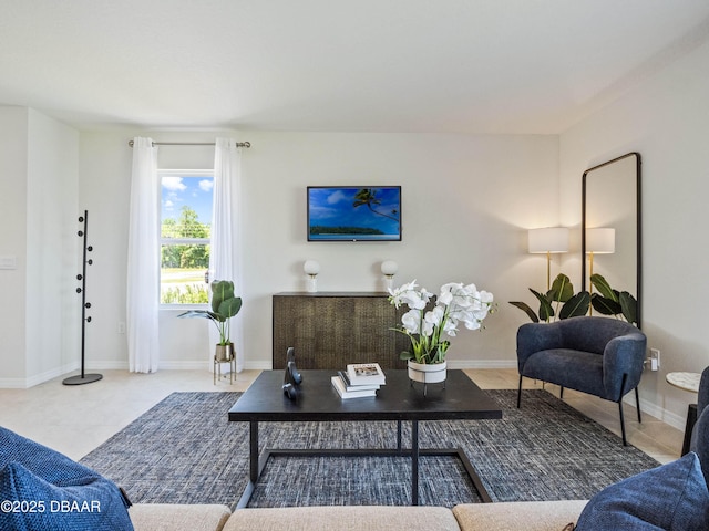 living room with tile patterned flooring