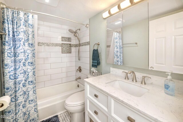 2301 S Atlantic Ave Unit 315, Daytona Beach, FL 32118 - full bathroom featuring shower / bath combo with shower curtain, vanity, and toilet