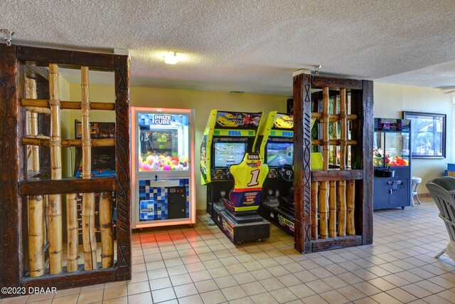 2301 S Atlantic Ave Unit 315, Daytona Beach, FL 32118 - playroom with a textured ceiling and light tile patterned flooring