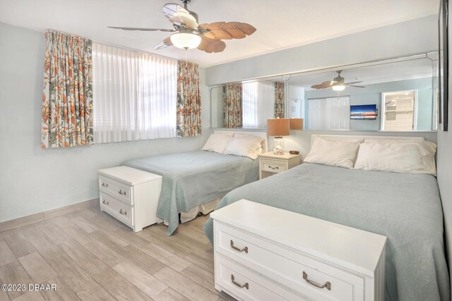 2301 S Atlantic Ave Unit 315, Daytona Beach, FL 32118 - bedroom featuring ceiling fan and light hardwood / wood-style flooring