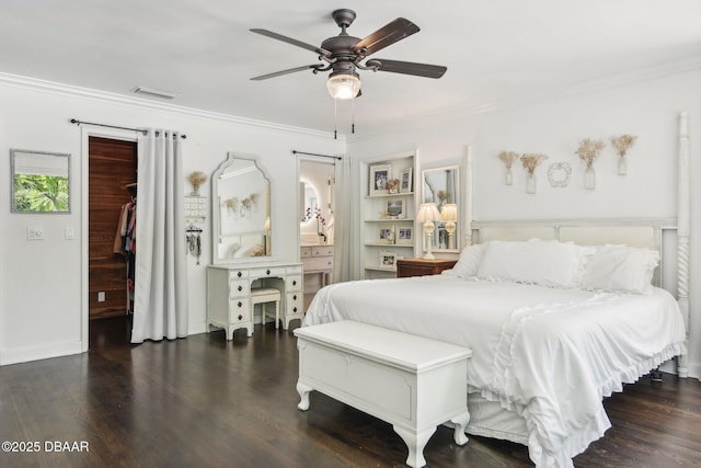 bedroom featuring a ceiling fan, visible vents, crown molding, and wood finished floors