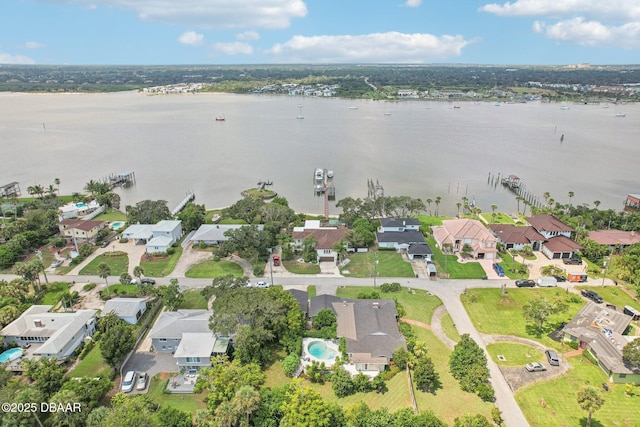 bird's eye view with a water view and a residential view