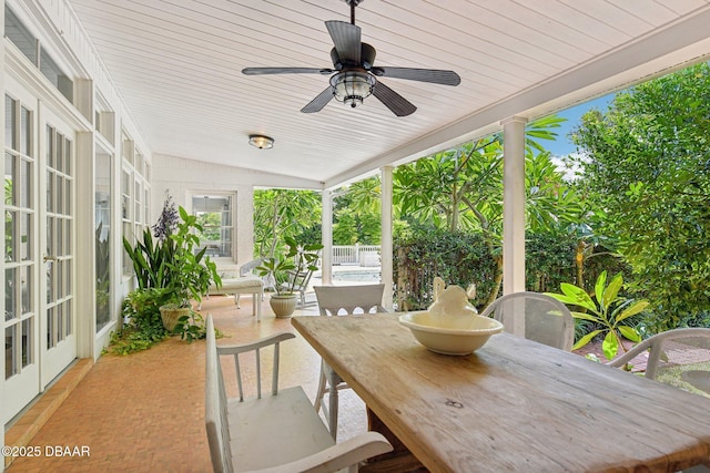 view of patio / terrace with ceiling fan, french doors, and outdoor dining area