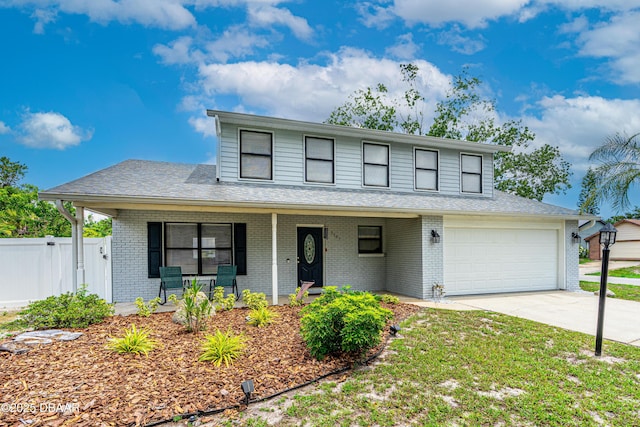 1197 Southfork Ct, Port Orange, FL 32129 - traditional home featuring covered porch, brick siding, driveway, and a garage