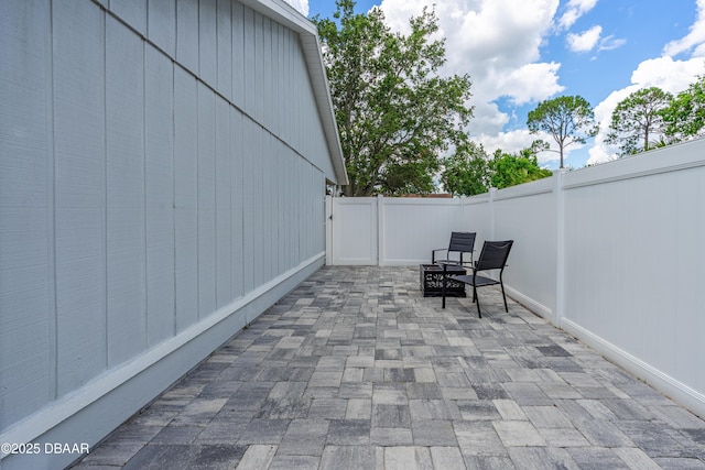 1197 Southfork Ct, Port Orange, FL 32129 - fenced backyard featuring a patio area