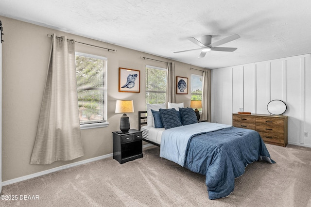 1197 Southfork Ct, Port Orange, FL 32129 - carpeted bedroom featuring a textured ceiling and a ceiling fan