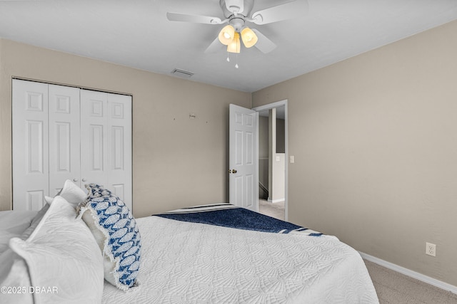 1197 Southfork Ct, Port Orange, FL 32129 - bedroom featuring carpet floors, a closet, and a ceiling fan