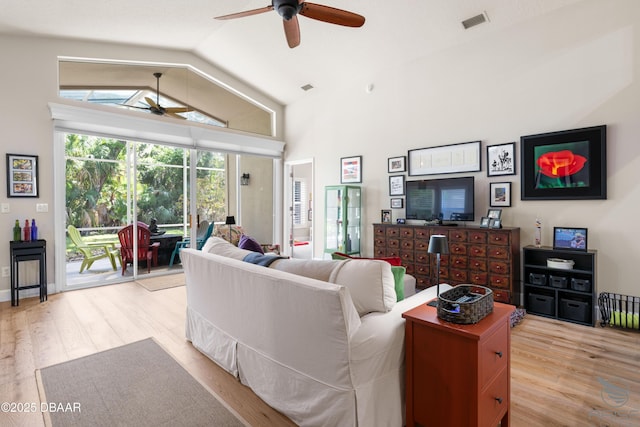 3349 Glenshane Way, Ormond Beach, FL 32174 - living area with a ceiling fan, wood finished floors, and high vaulted ceiling