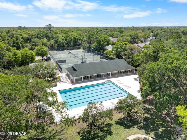 3349 Glenshane Way, Ormond Beach, FL 32174 - aerial view of a forest and a pool area