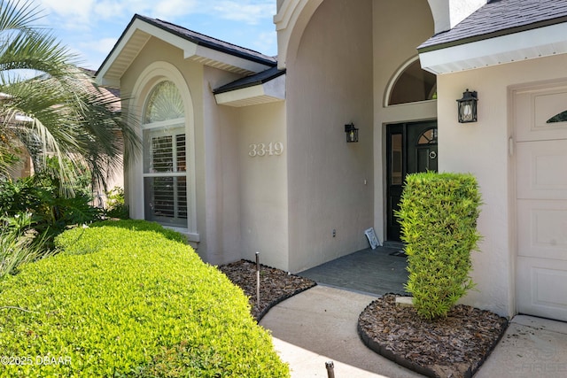 3349 Glenshane Way, Ormond Beach, FL 32174 - property entrance featuring stucco siding