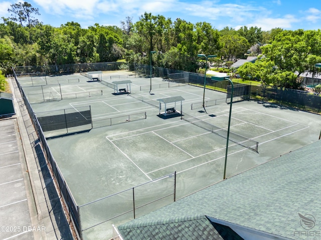 3349 Glenshane Way, Ormond Beach, FL 32174 - view of tennis court with view of wooded area