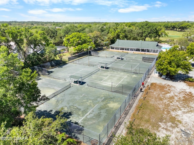 3349 Glenshane Way, Ormond Beach, FL 32174 - view of tennis court with a forest view
