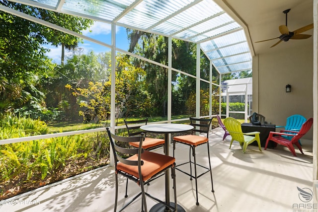 3349 Glenshane Way, Ormond Beach, FL 32174 - sunroom featuring ceiling fan, outdoor dining area, and plenty of natural light