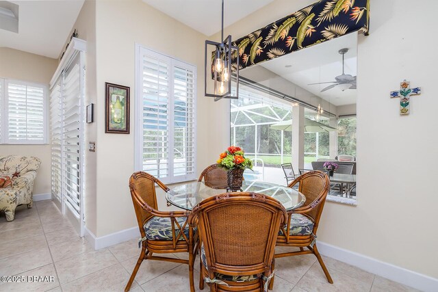 1491 Hohe Ln, Ormond Beach, FL 32174 - dining space featuring baseboards, ceiling fan, and light tile patterned floors