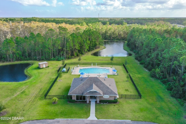 drone / aerial view with a water view