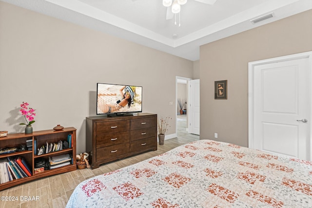 bedroom featuring light wood-type flooring and ceiling fan