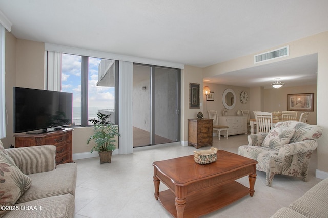3043 S Atlantic Ave Unit 204, Daytona Beach Shores, FL 32118 - living room with baseboards