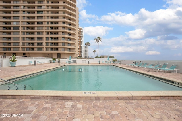 3043 S Atlantic Ave Unit 204, Daytona Beach Shores, FL 32118 - community pool with a patio area