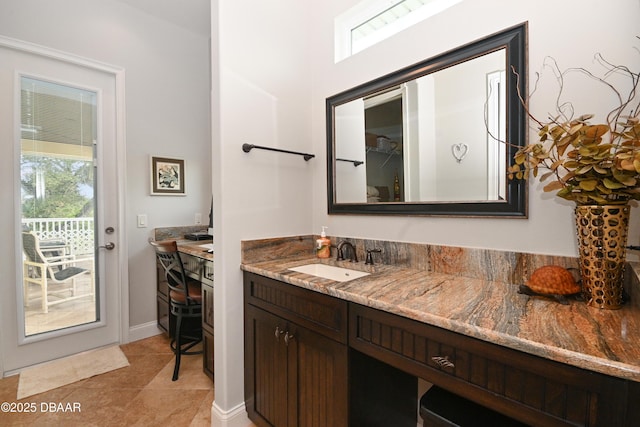 bathroom featuring vanity and tile patterned floors