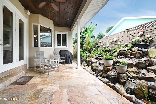 view of patio / terrace with area for grilling and ceiling fan