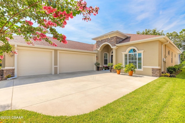 3418 Leonardo Ln, New Smyrna Beach, FL 32168 - mediterranean / spanish-style house featuring stone siding, stucco siding, an attached garage, and driveway