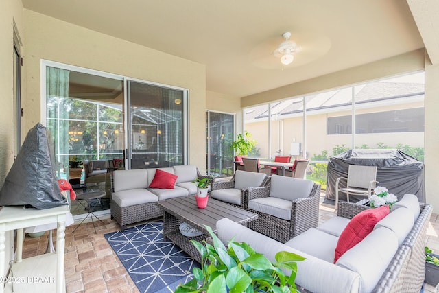 3418 Leonardo Ln, New Smyrna Beach, FL 32168 - sunroom / solarium featuring outdoor lounge area, a ceiling fan, and outdoor dining space