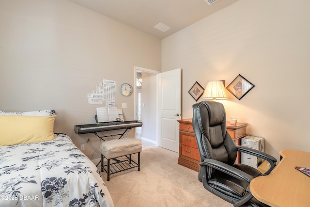 3418 Leonardo Ln, New Smyrna Beach, FL 32168 - bedroom with a desk and light colored carpet