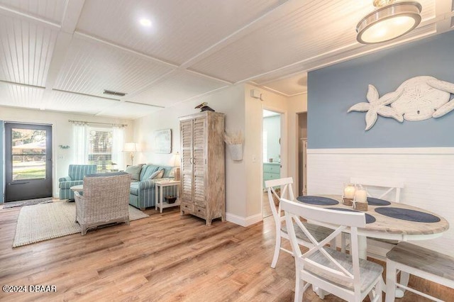 dining space featuring hardwood / wood-style flooring