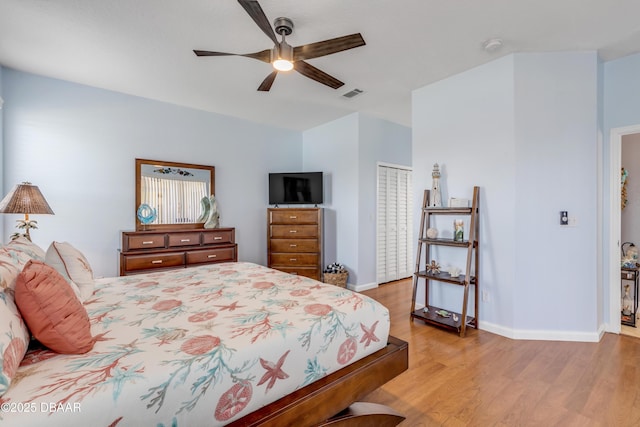 bedroom featuring ceiling fan and light hardwood / wood-style flooring