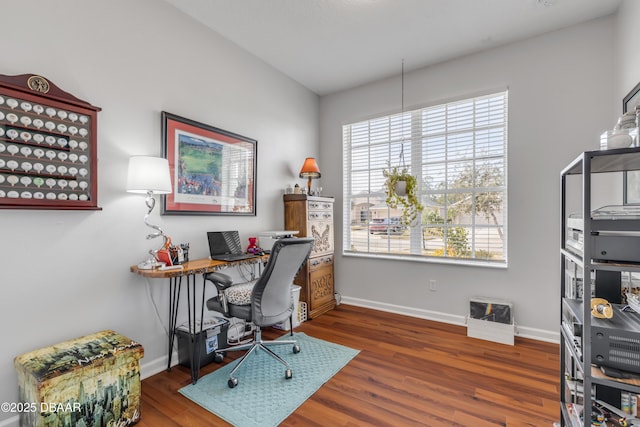 home office featuring dark wood-type flooring