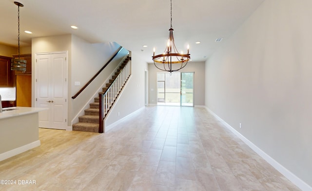 interior space featuring a notable chandelier