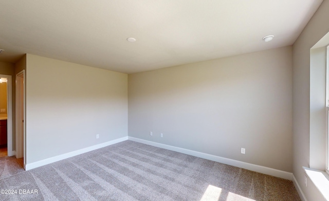 view of carpeted spare room