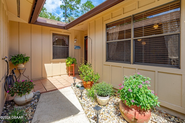 doorway to property featuring a patio area