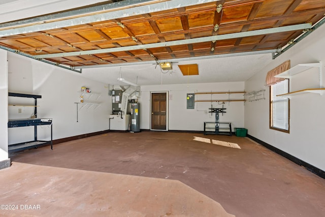 garage with electric panel, electric water heater, and a garage door opener