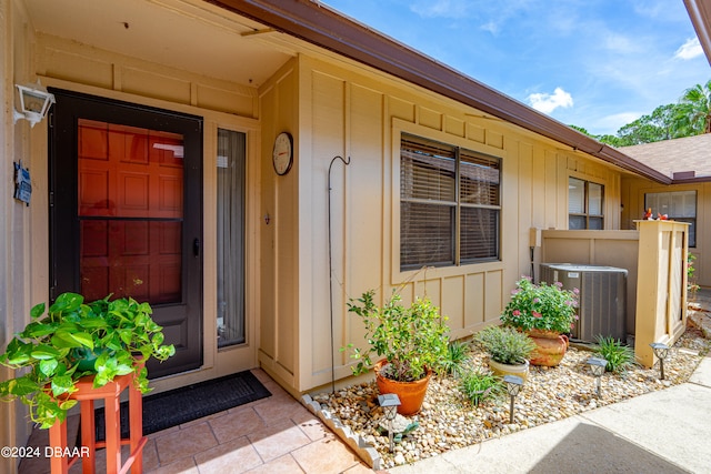 doorway to property with central air condition unit