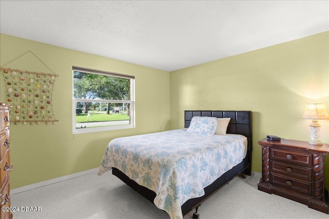 bedroom featuring a textured ceiling